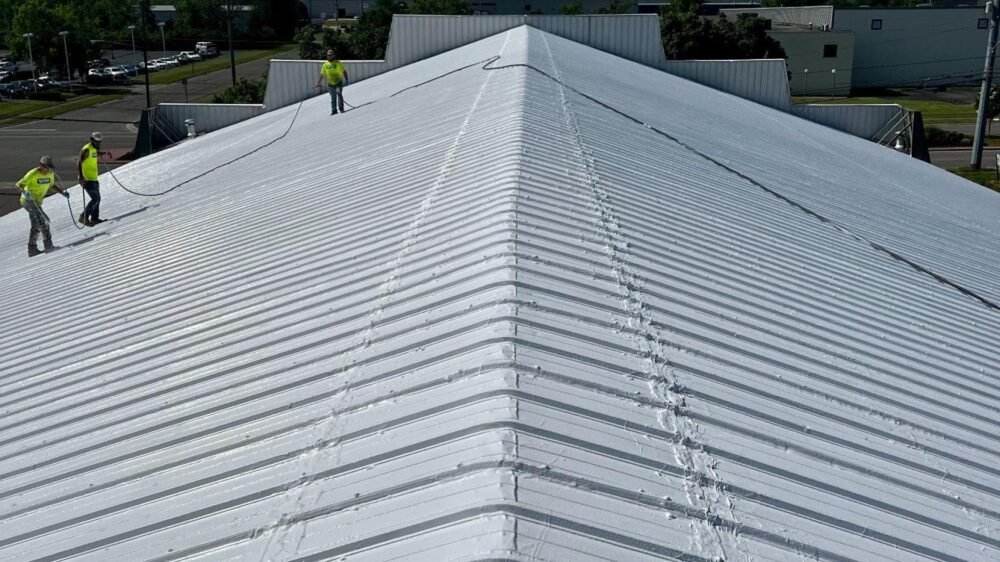 Oklahoma Roofing FAQs example showing commercial metal roof installation in Oklahoma City